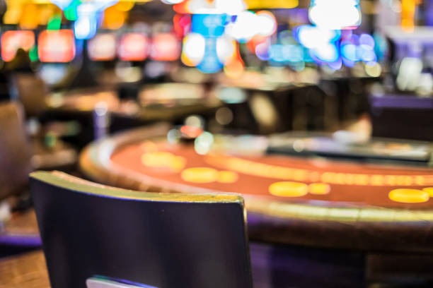 Live dealer in studio with professional setup and camera focus on cards